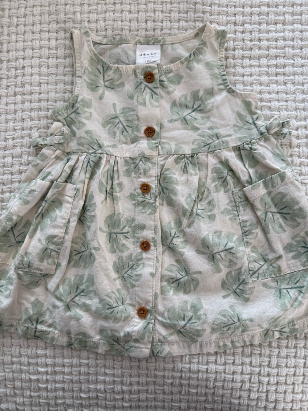 Little Co. Sleeveless Cream Dress with Green Leaf Print